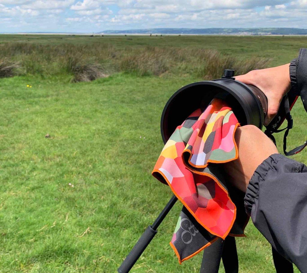 Camera lens care with an optical-grade microfibre cloth