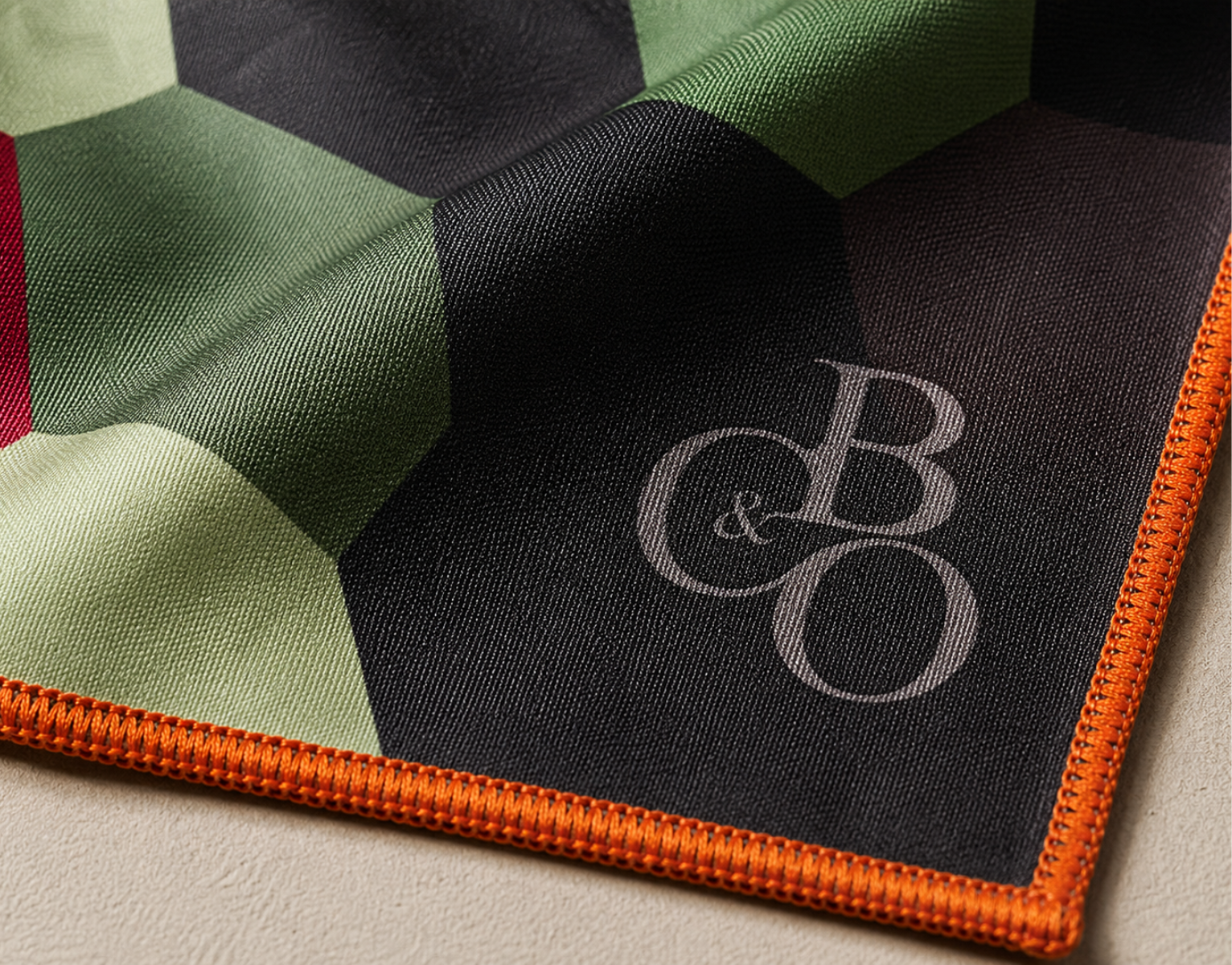 Close detail of Blossom of Colour microfibre, stitched edge and printed mark