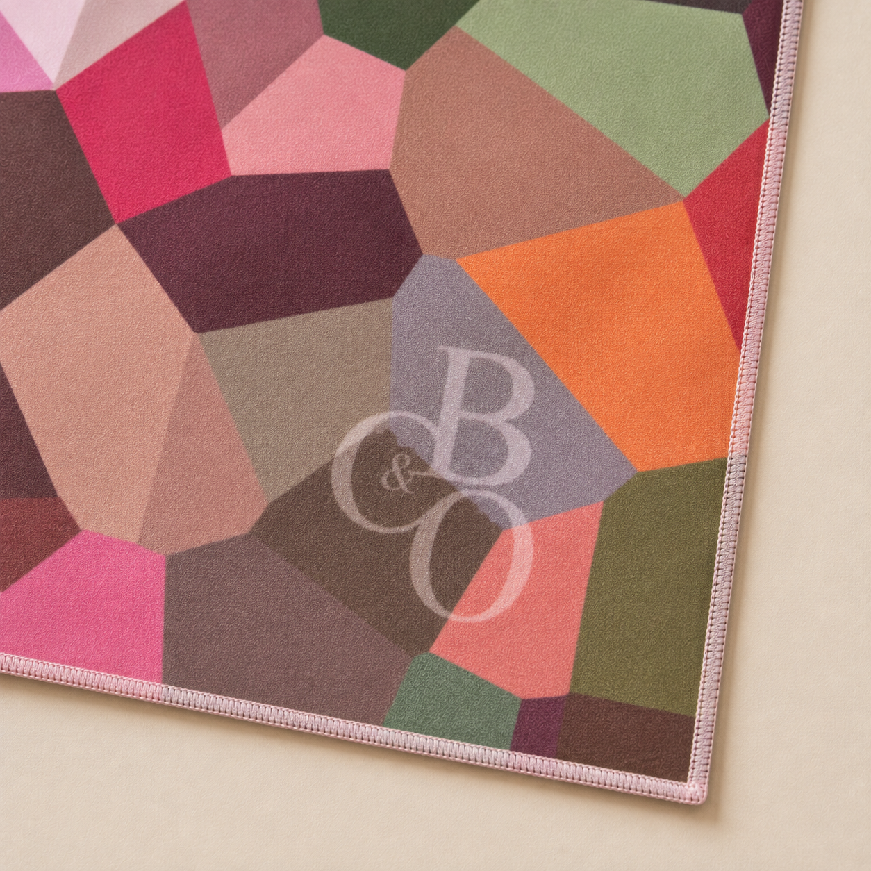 Close detail of the Maple artwork, microfibre texture, stitched edge and B and Co mark
