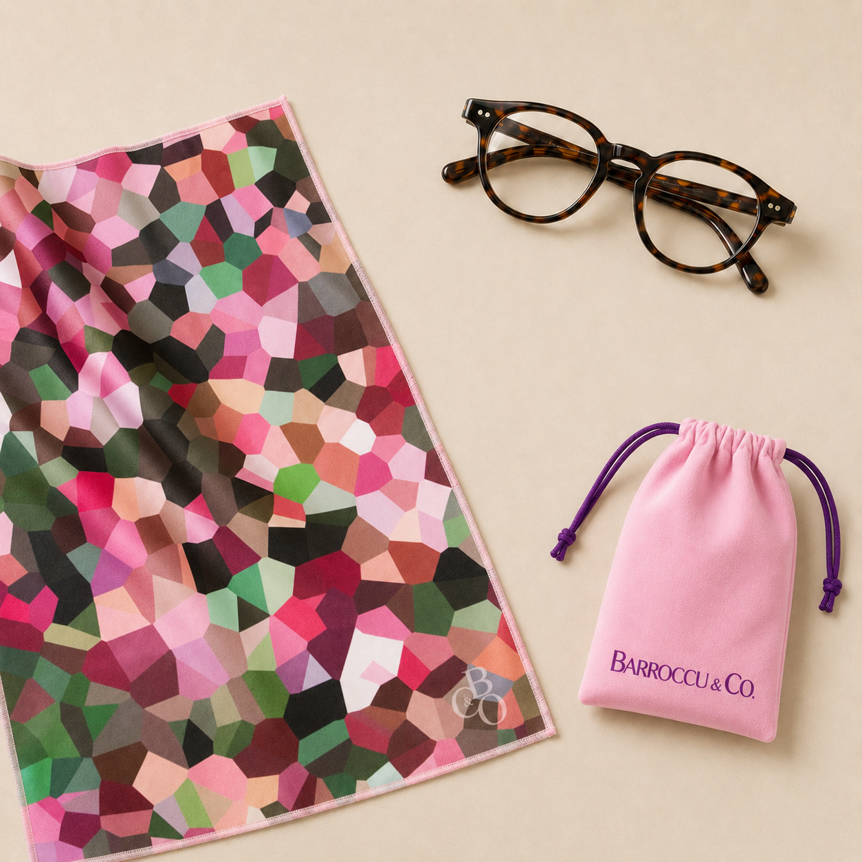 Maple cloth presented with glasses and its included pink protective pouch