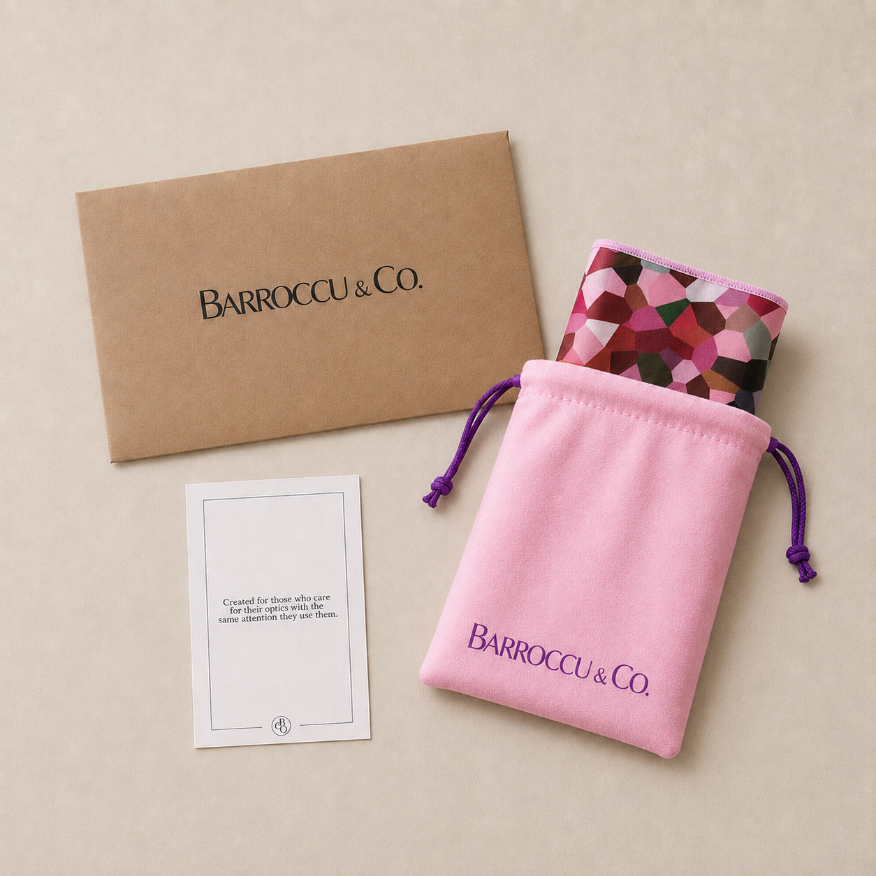 Maple cloth and pink pouch presented with Barroccu and Co packaging and care card