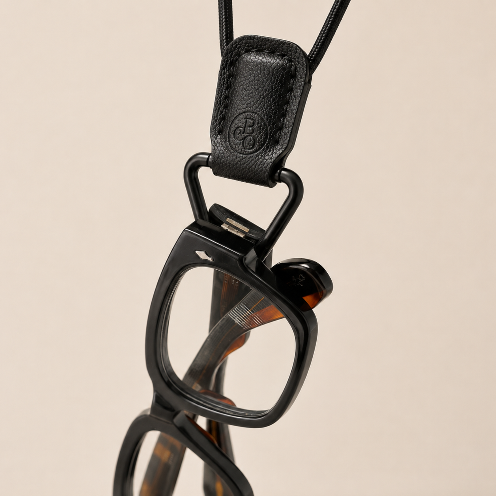 Close-up of a thicker acetate frame placed through The Signature Loop