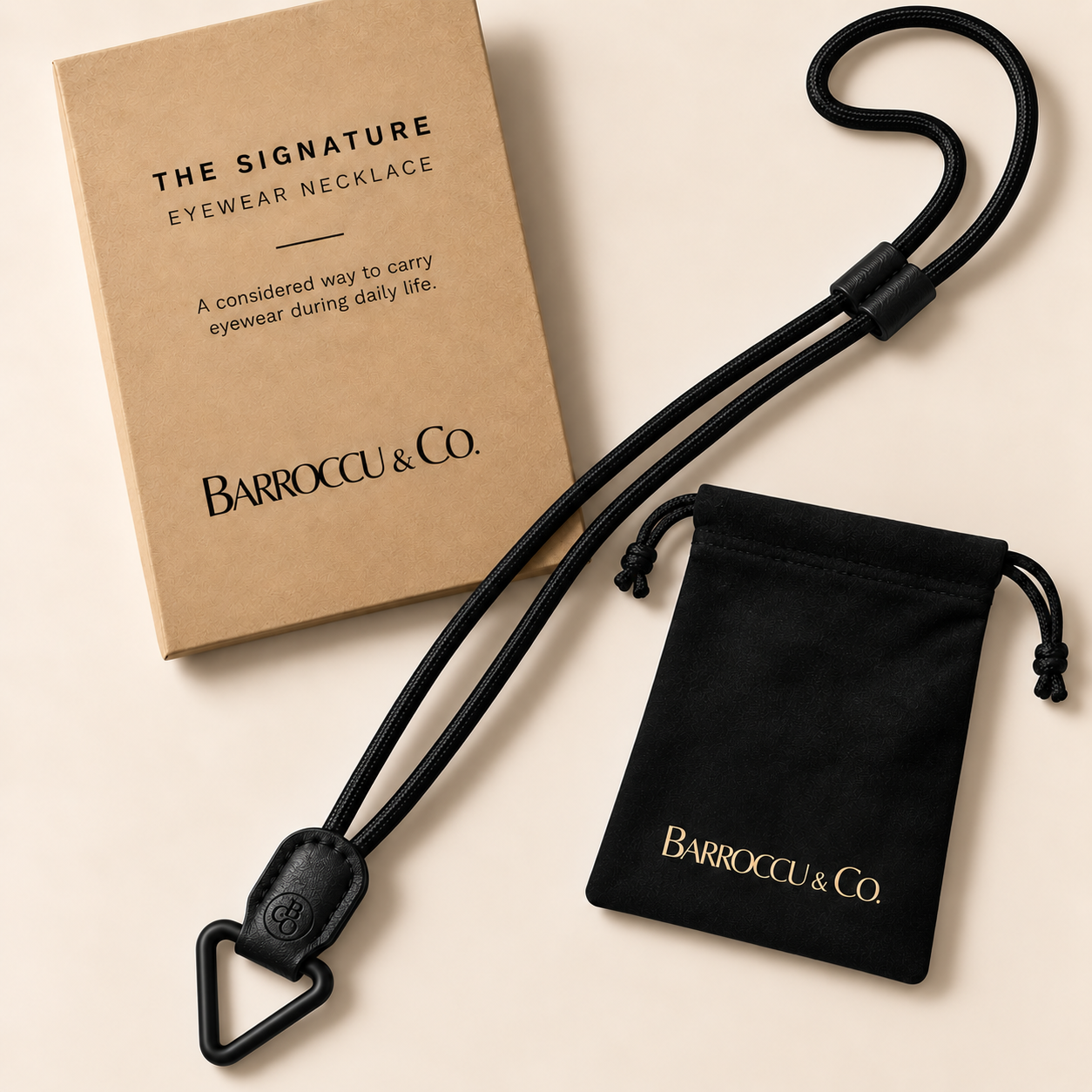 The Signature Eyewear Necklace with its Barroccu & Co. storage pouch and presentation packaging